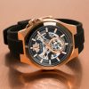 Bulova Maquina Skeleton Automatic men's watch with rose gold tone case and black rubber strap model 98A177
